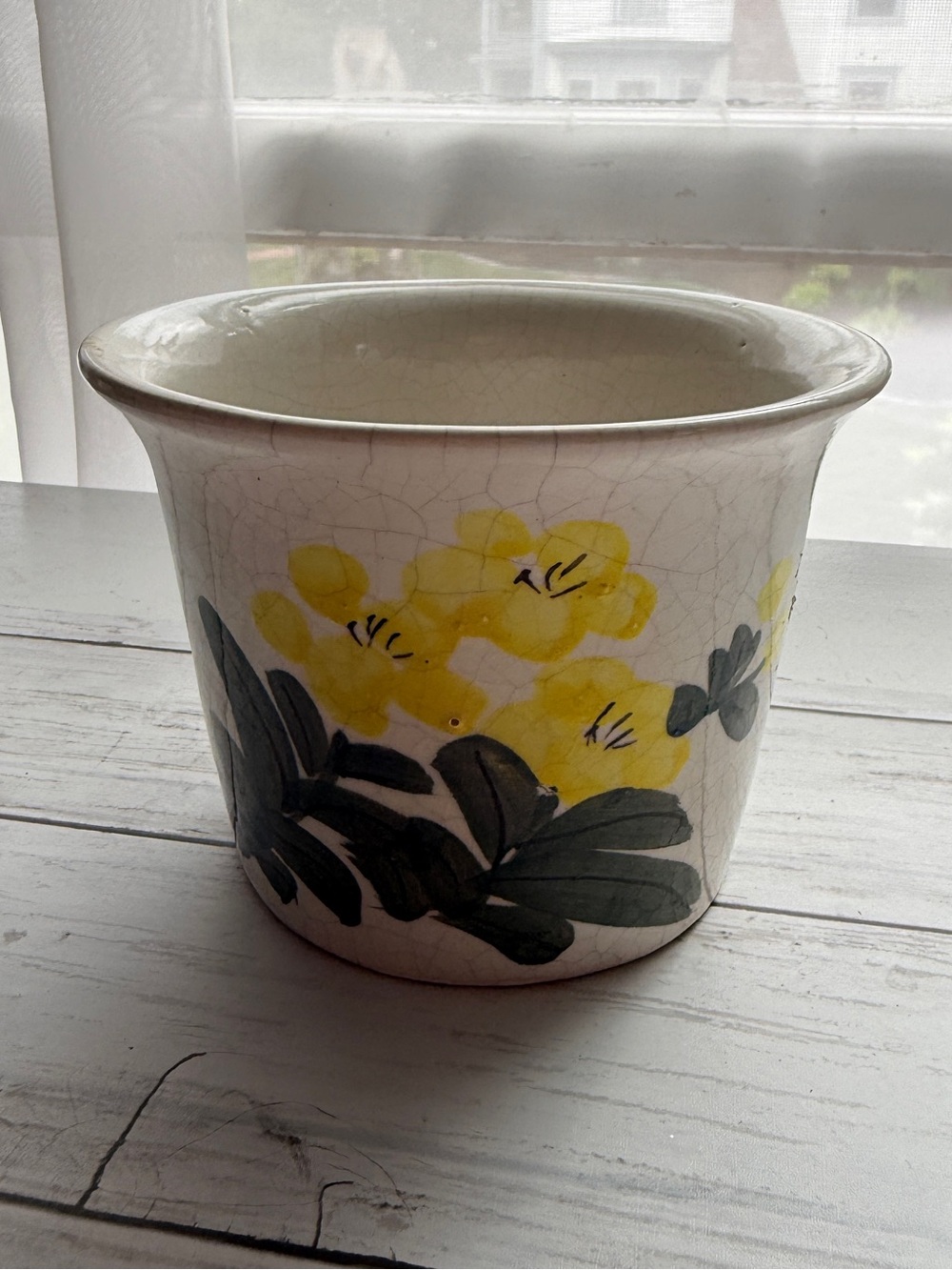 Hand-Painted Yellow Floral Ceramic Pot with Green Leaves